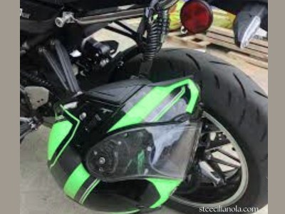 How to use a helmet lock on a motorcycle